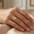 LADIES RING 0.15CT ROUND/BAGUETTE DIAMOND 10K YELLOW GOLD