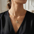 LADIES PENDANT 0.15CT ROUND/BAGUETTE DIAMOND 10K YELLOW GOLD