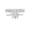 LADIES BRIDAL SET 4 1/10CT ROUND DIAMOND 14K WHITE GOLD (CENTER STONE ROUND DIAMOND 2 1/2CT)