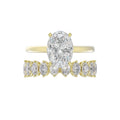 14K YELLOW GOLD 4 1/2CT ROUND/OVAL DIAMOND LADIES BRIDAL SET (CENTER STONE OVAL DIAMOND 3.00CT)