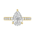 14K YELLOW GOLD 3 1/2CT ROUND/PEAR DIAMOND LADIES RING (CENTER STONE PEAR DIAMOND 3CT)